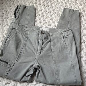 Anthropologie Light Gray Pants with zippers on the side of leg.